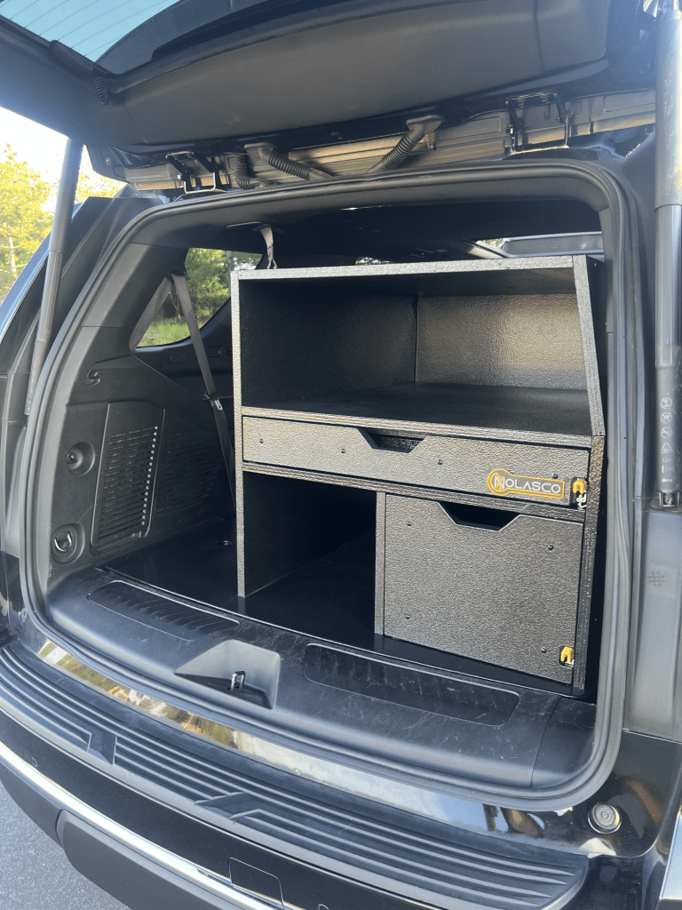Fire department command storage cabinet or box for Fire Chief SUVs, trucks and vehicles with optional magnetic dry erase command board and drawers for organized turnout and emergency gear